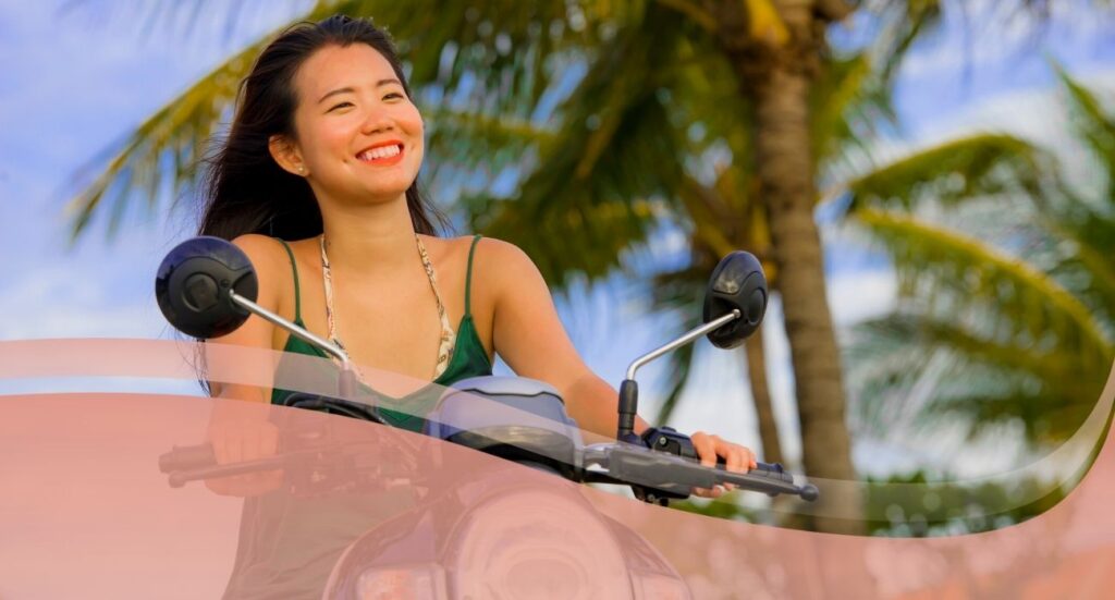 woman riding scooter