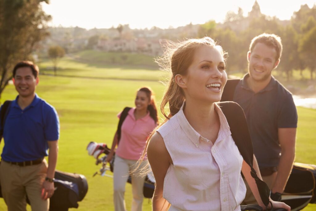 Group of friends playing golf