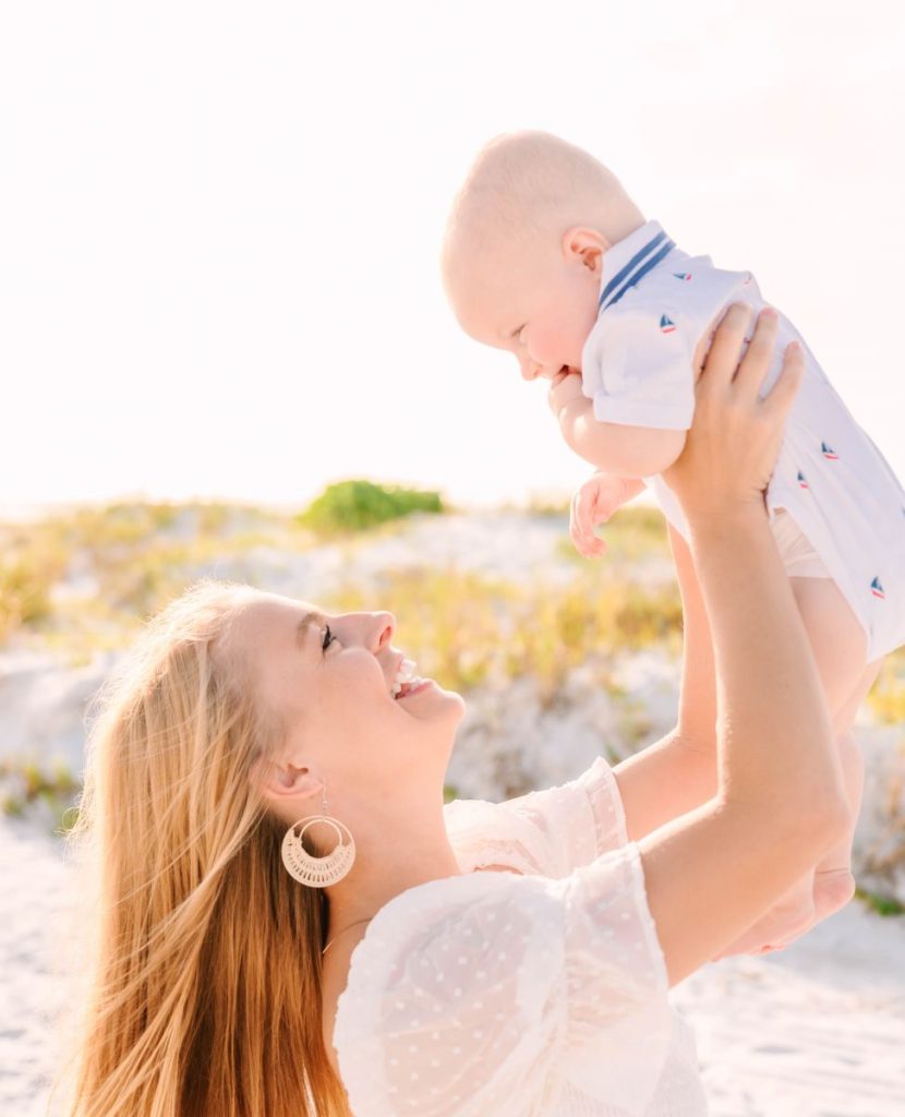 mother and baby at beach