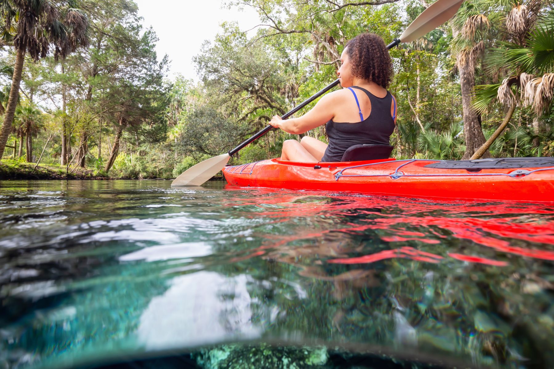 woman kayaking